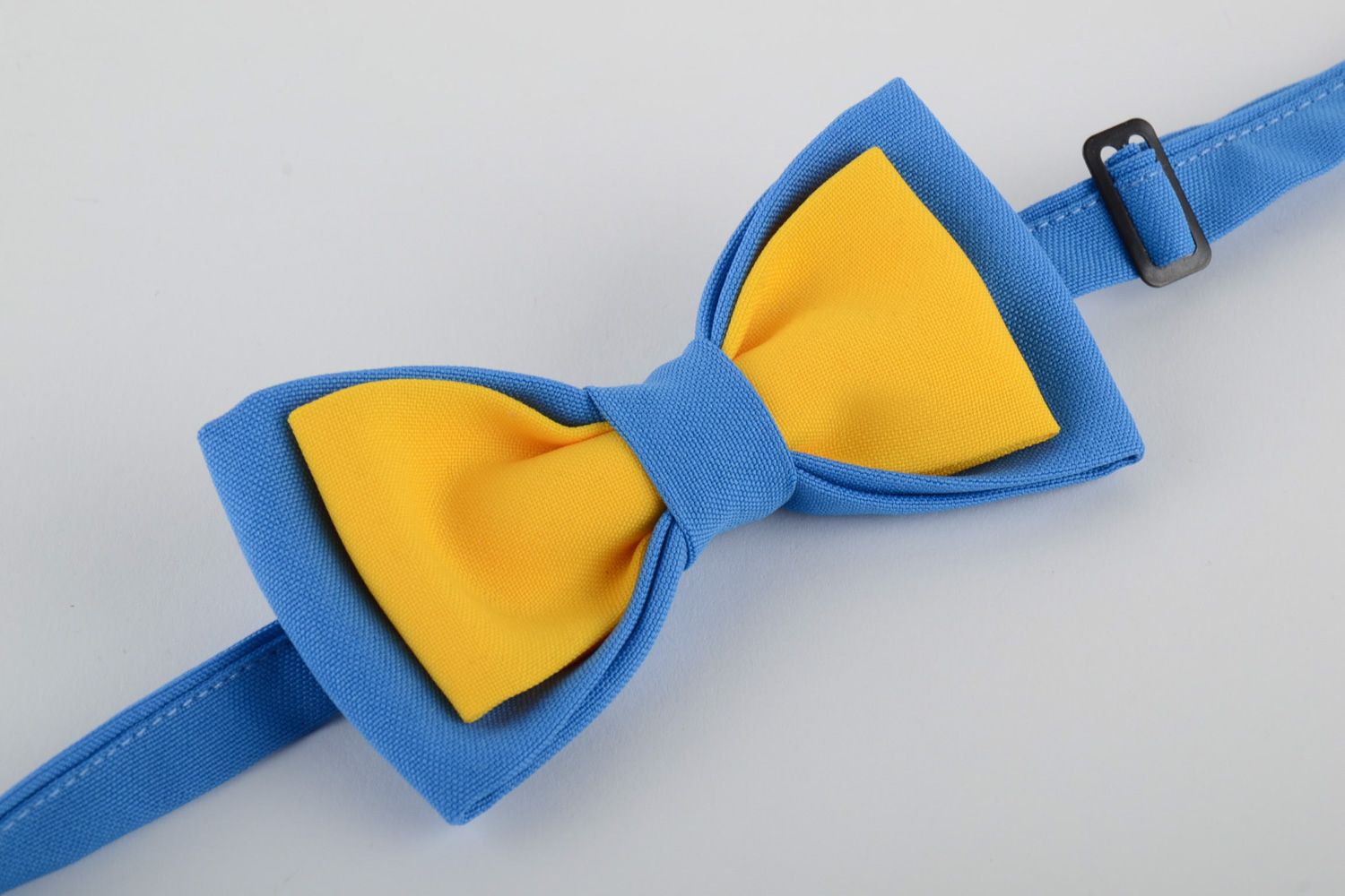 Handmade bow tie sewn of costume fabric in contrast combination of blue and yellow photo 4