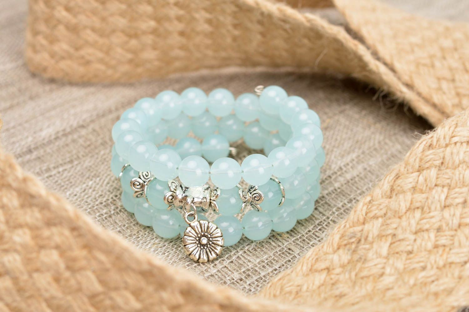 Three-layer beaded blue transparent bracelet for a girl photo 1