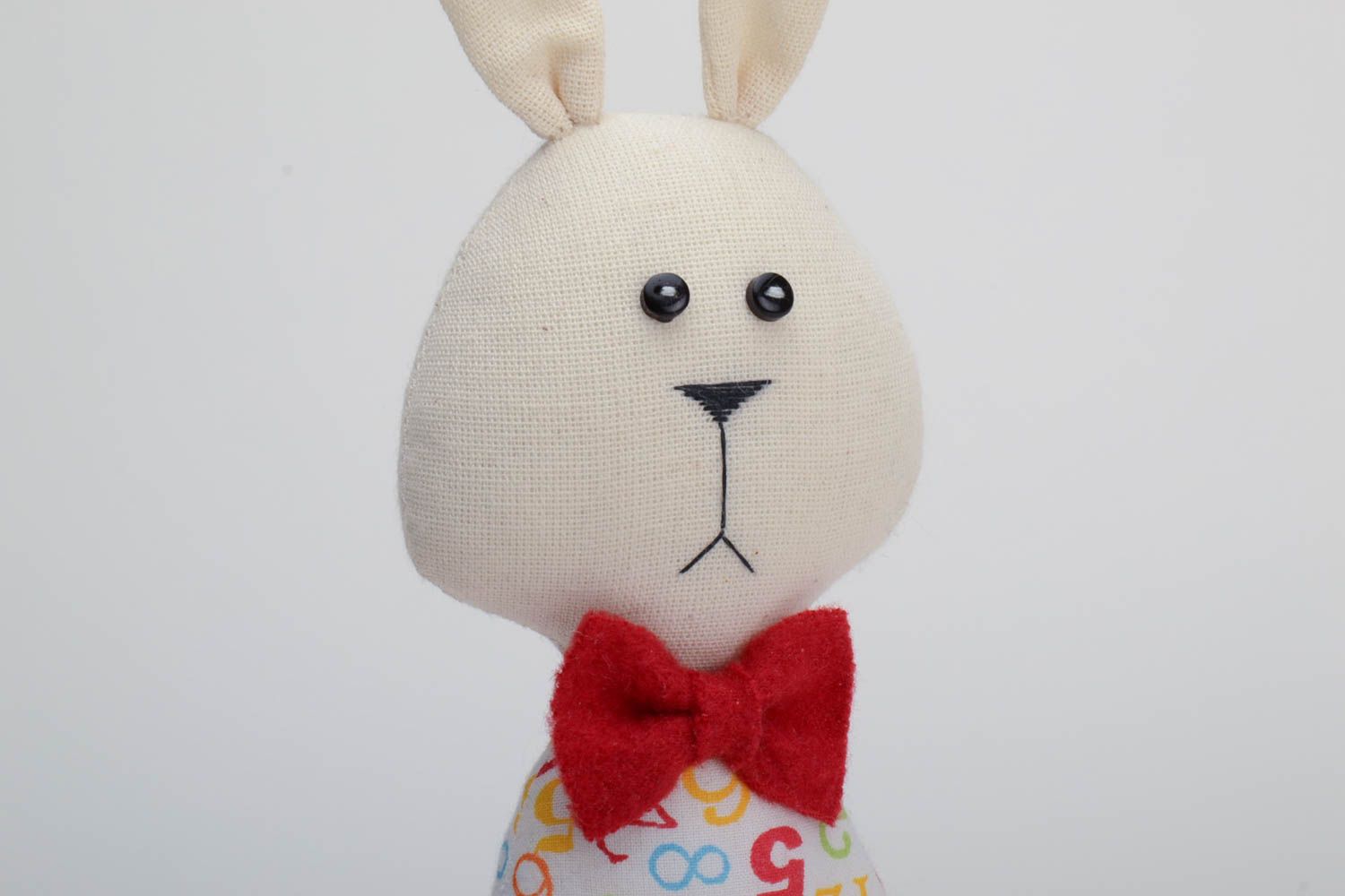 Handmade small cotton soft toy rabbit boy in striped trousers with red bow tie photo 3