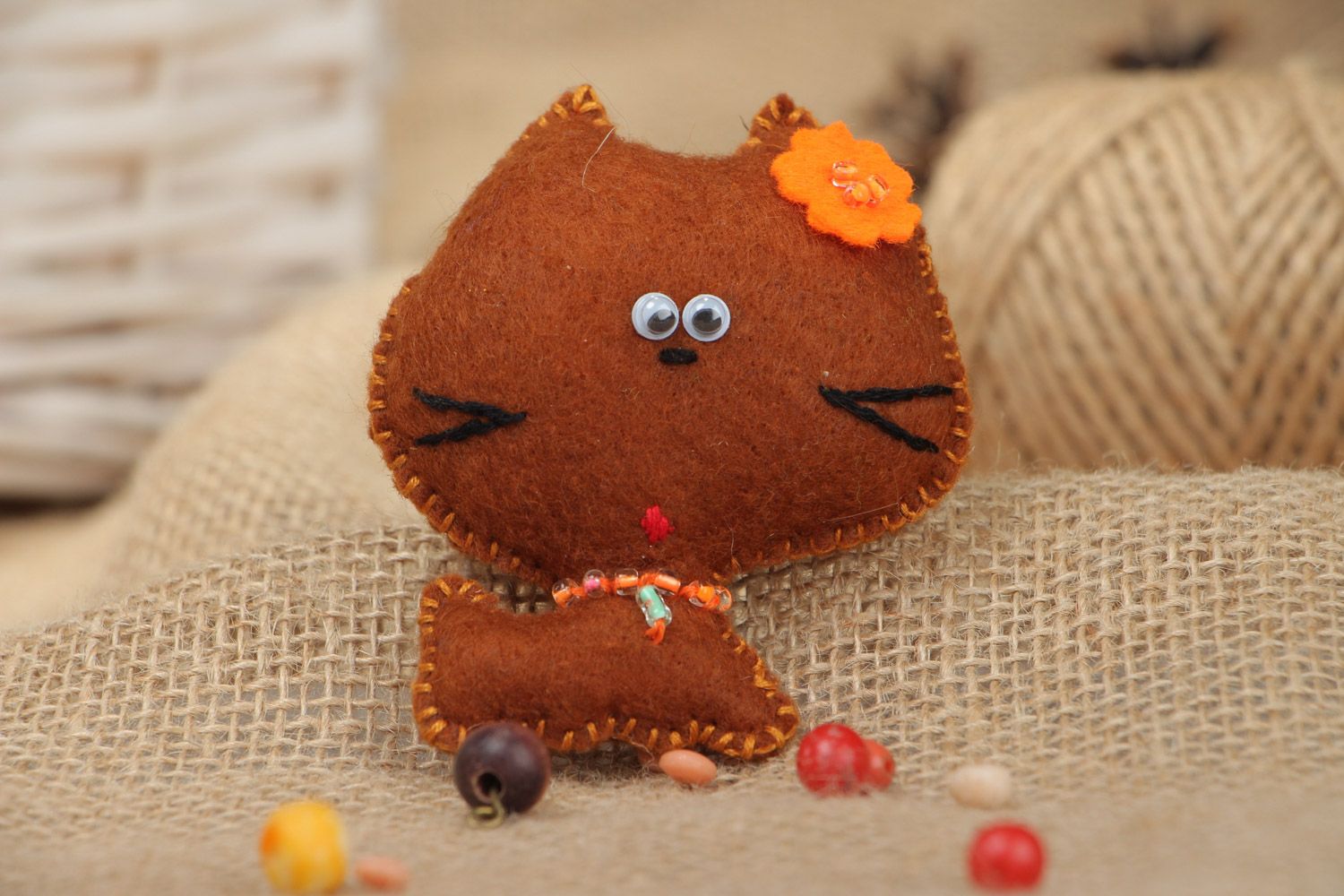 Handmade soft toy sewn of brown felt little kitten for interior decoration photo 1
