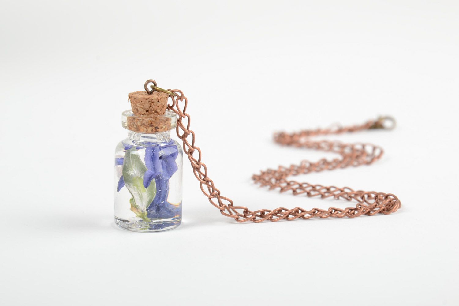Handmade epoxy resin pendant with real flowers inside in the shape of vial photo 4