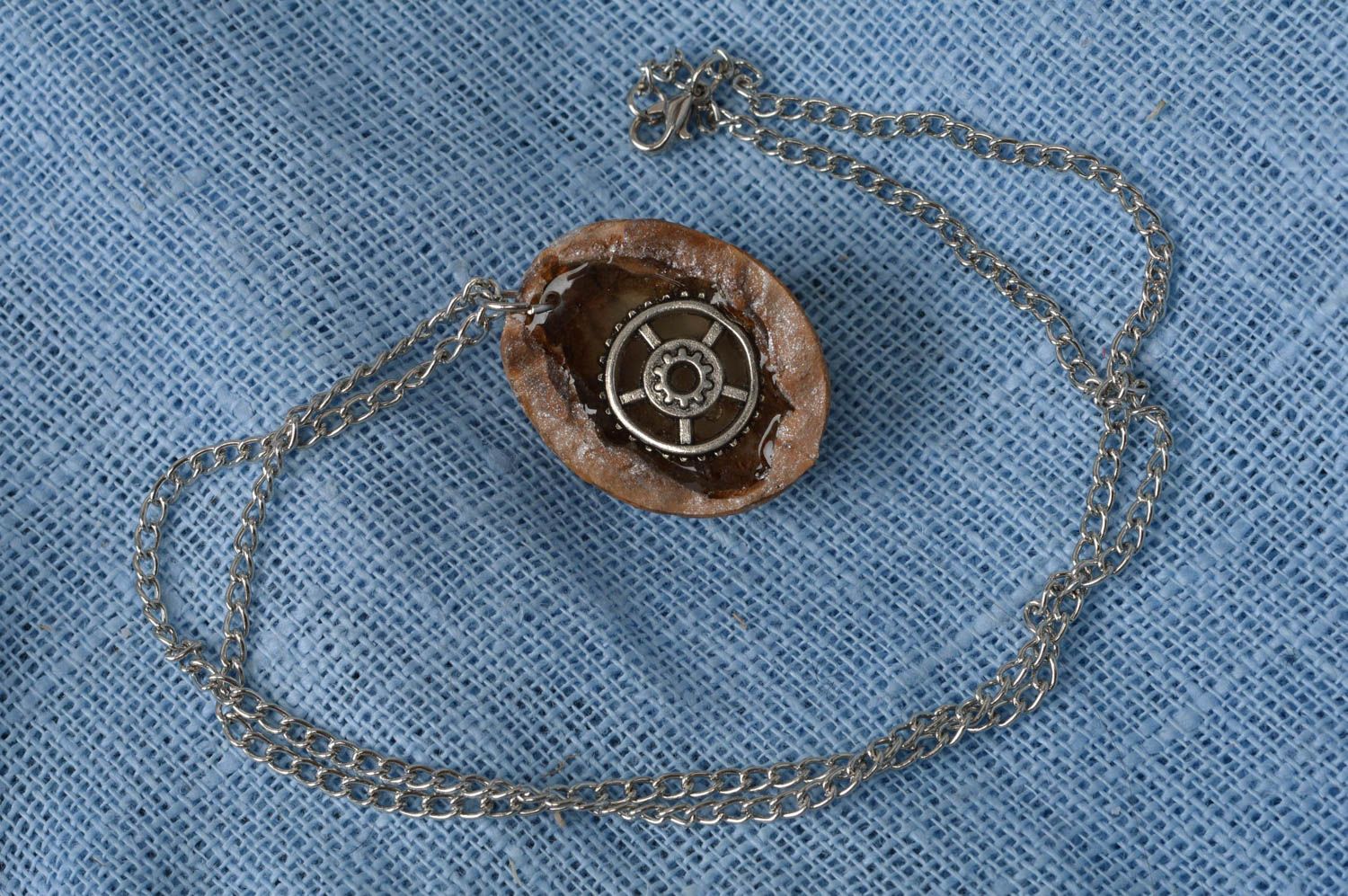 Handmade cute luminous unusual pendant made of nut with pinion on chain photo 1