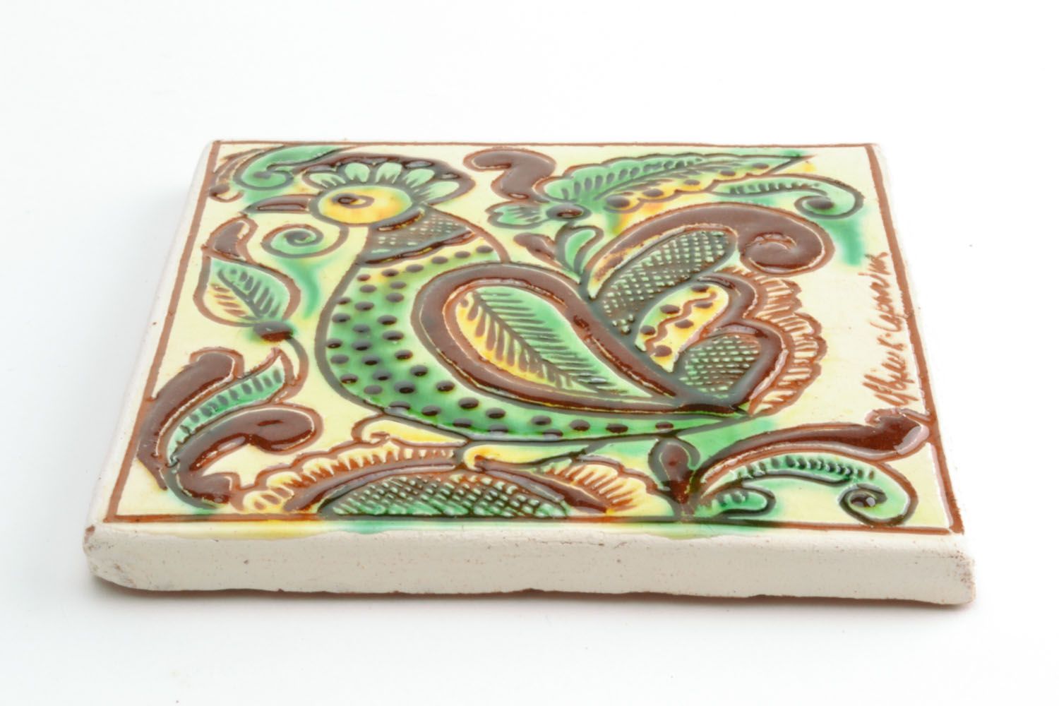 Azulejo de cerâmica artesanal pintado com tintas naturais em estilo étnico foto 3