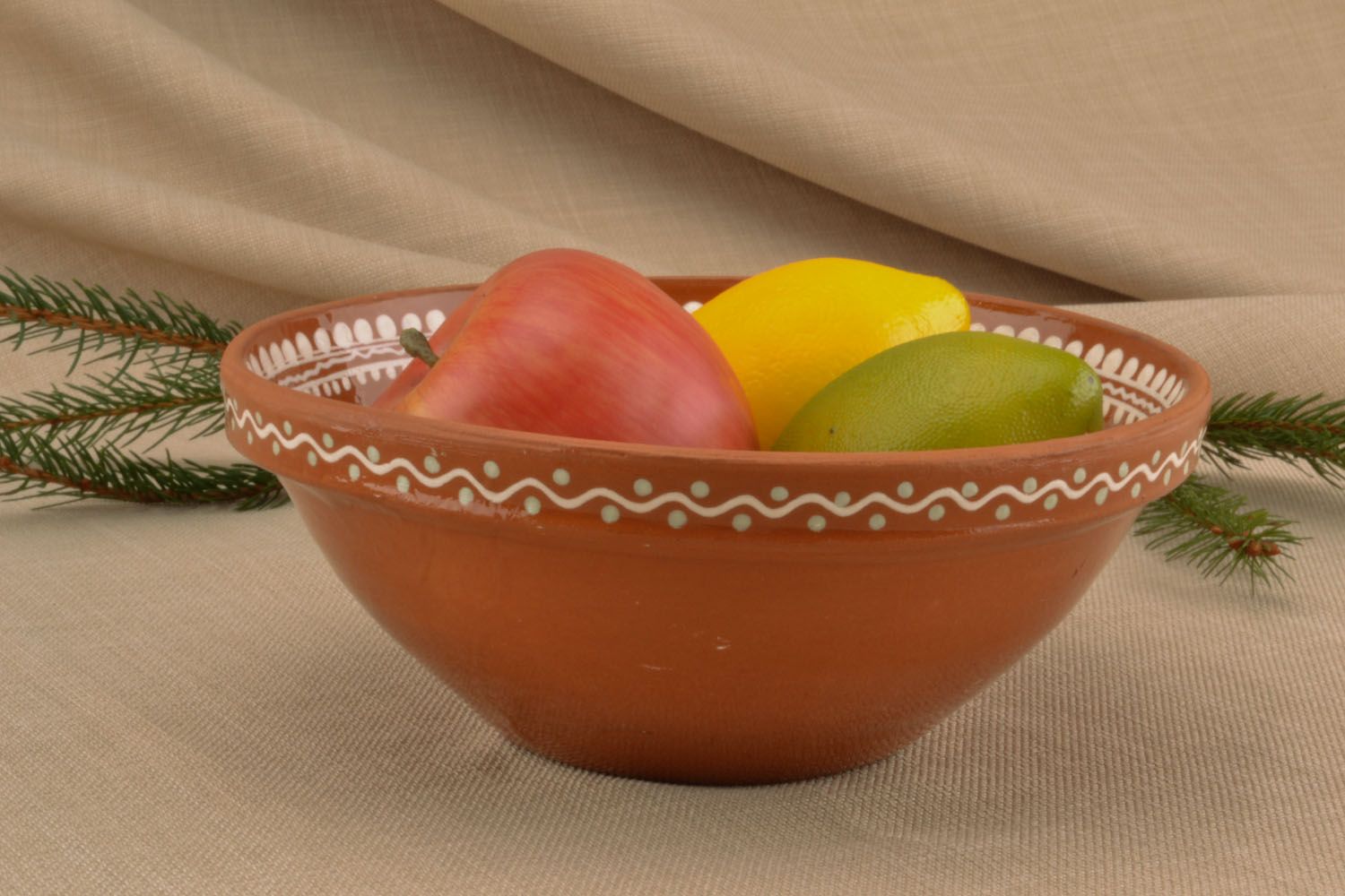 Clay bowl with paintings photo 1