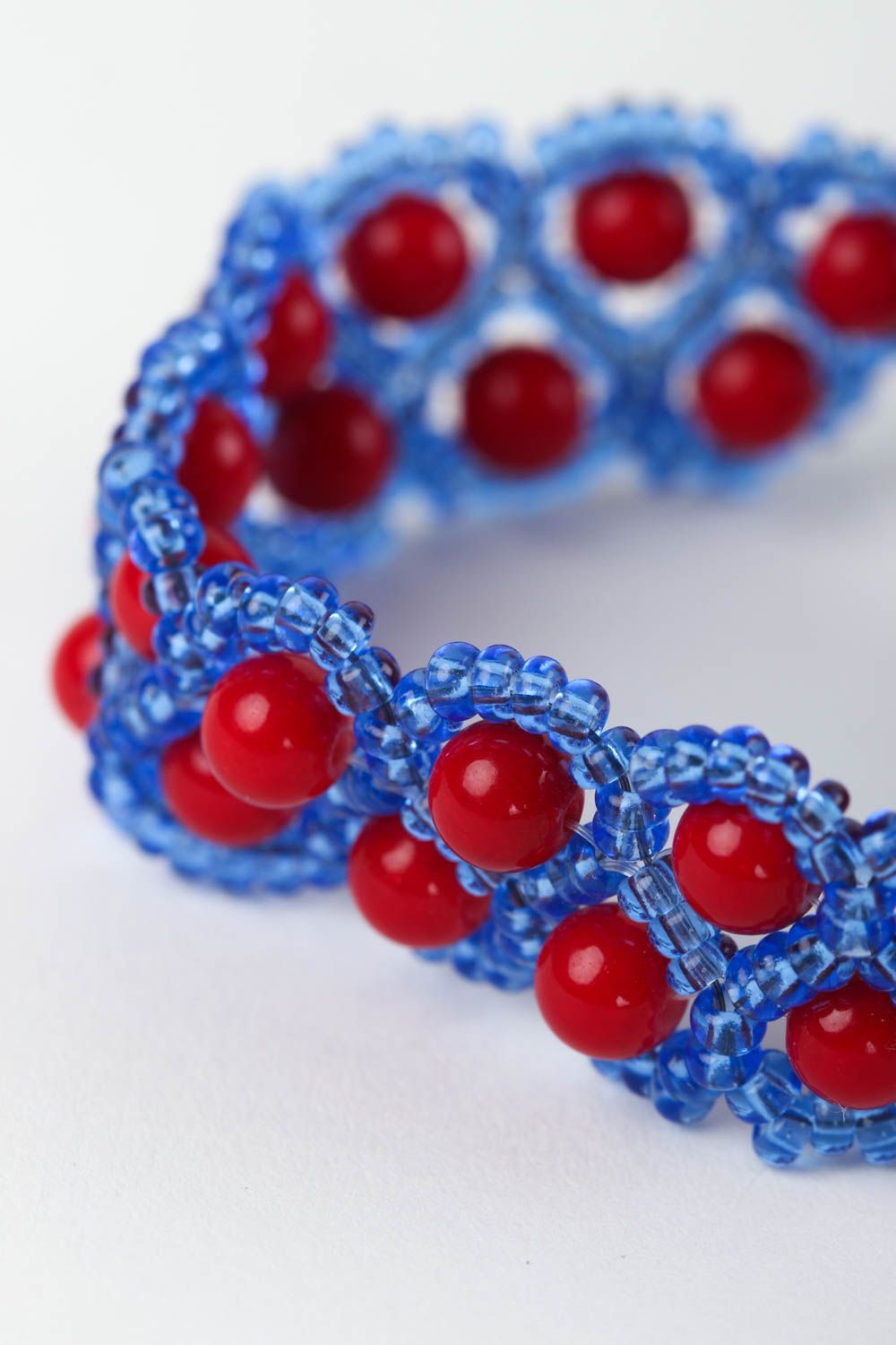 Blue and red beads bracelet on the adjustable chain photo 3