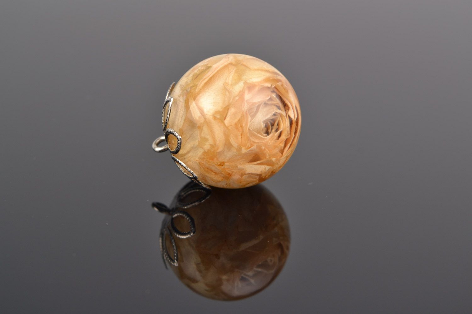 Handmade botanical pendant with rose coated with epoxy in the shape of transparent ball photo 1