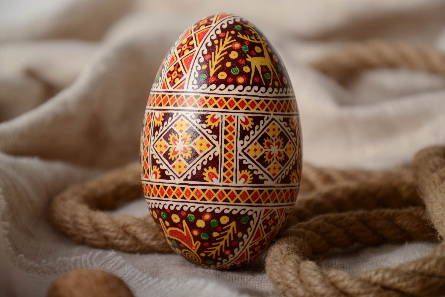 Handmade colorful decorative Easter pysanka goose egg with wax painting photo 1