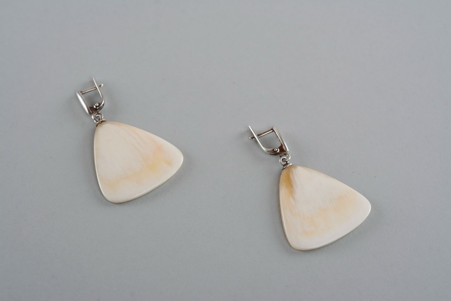 Silver earrings with a natural horn Mediator photo 4