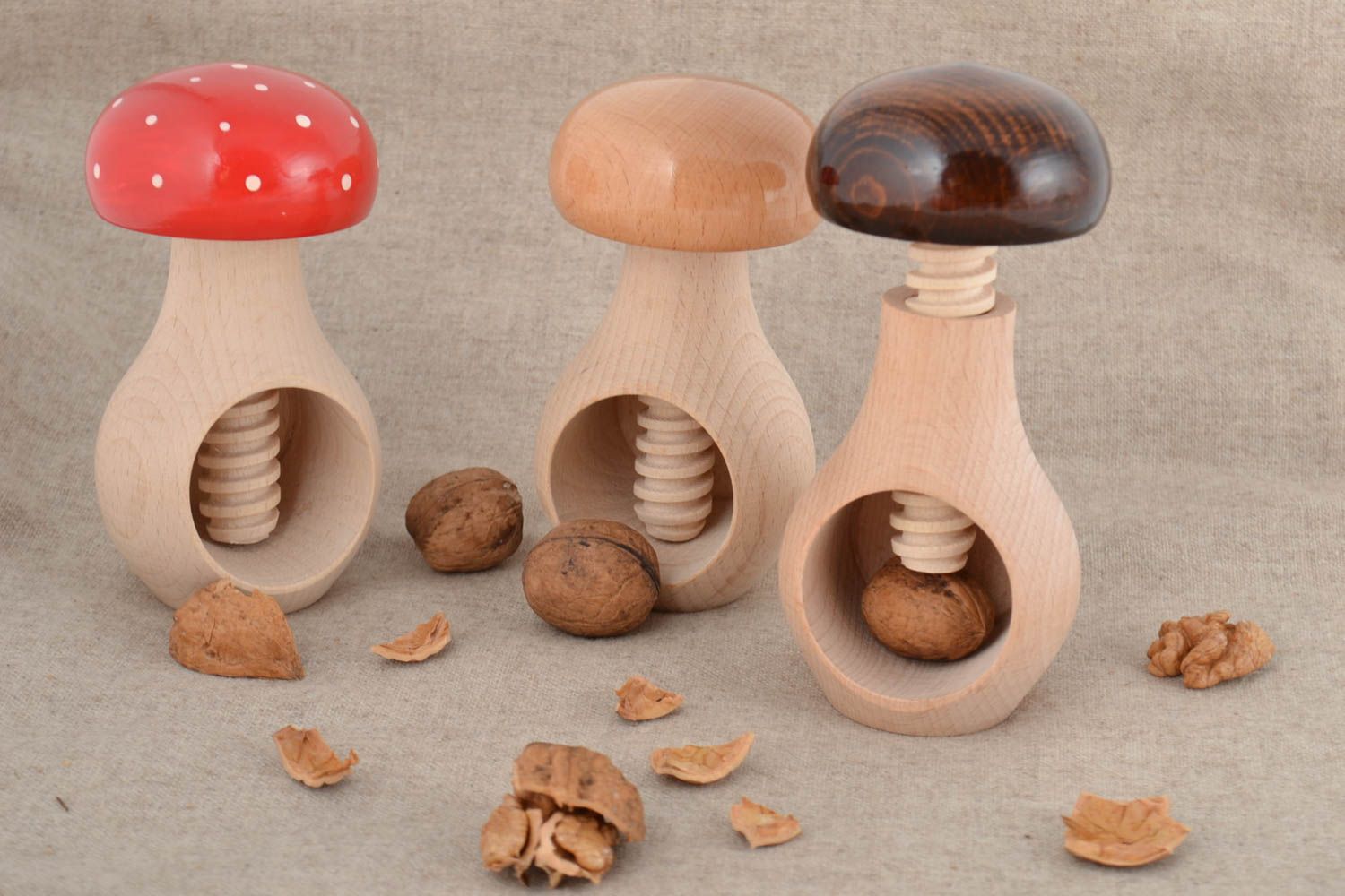 Set of handmade wooden nutcrackers Mushrooms 3 pieces for crushing nuts photo 1