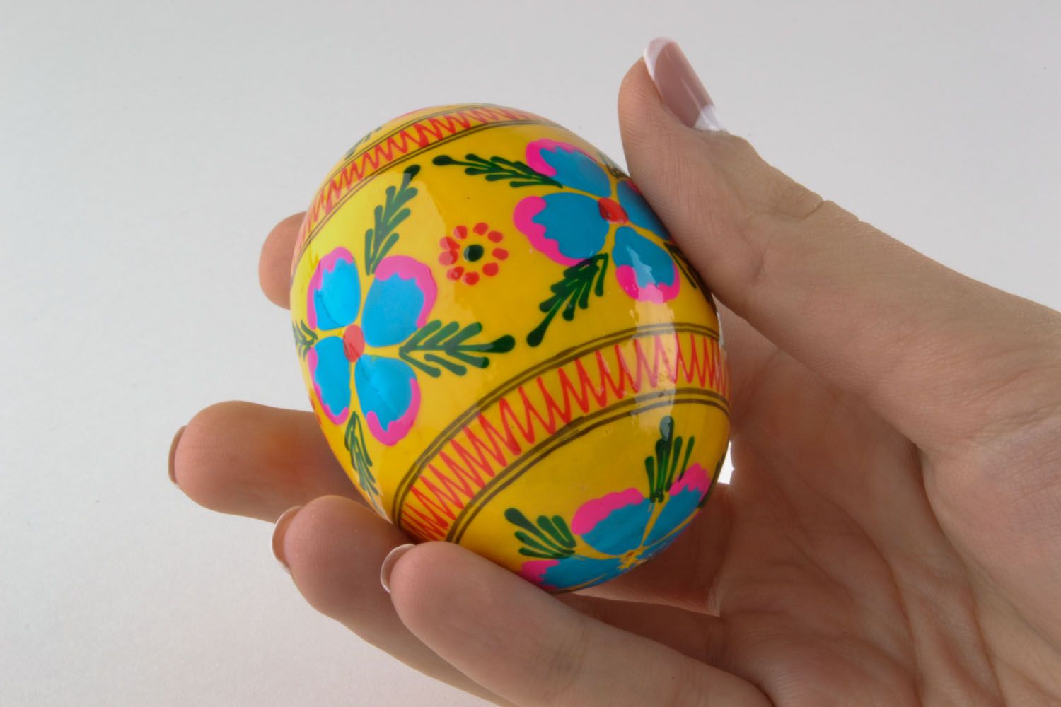 Painted wooden egg for decoration photo 5
