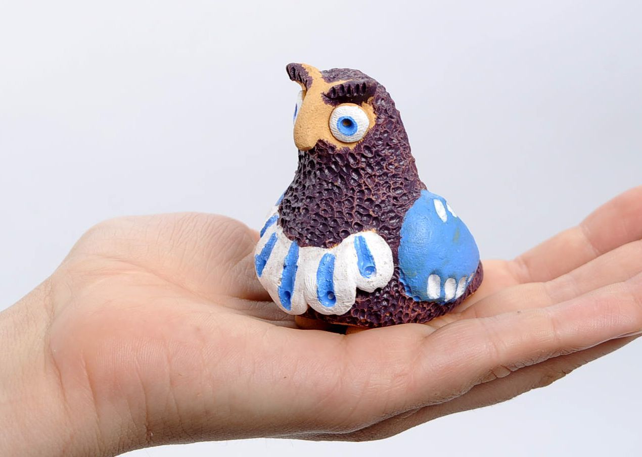 Penny whistle in the form of owl made of clay photo 4