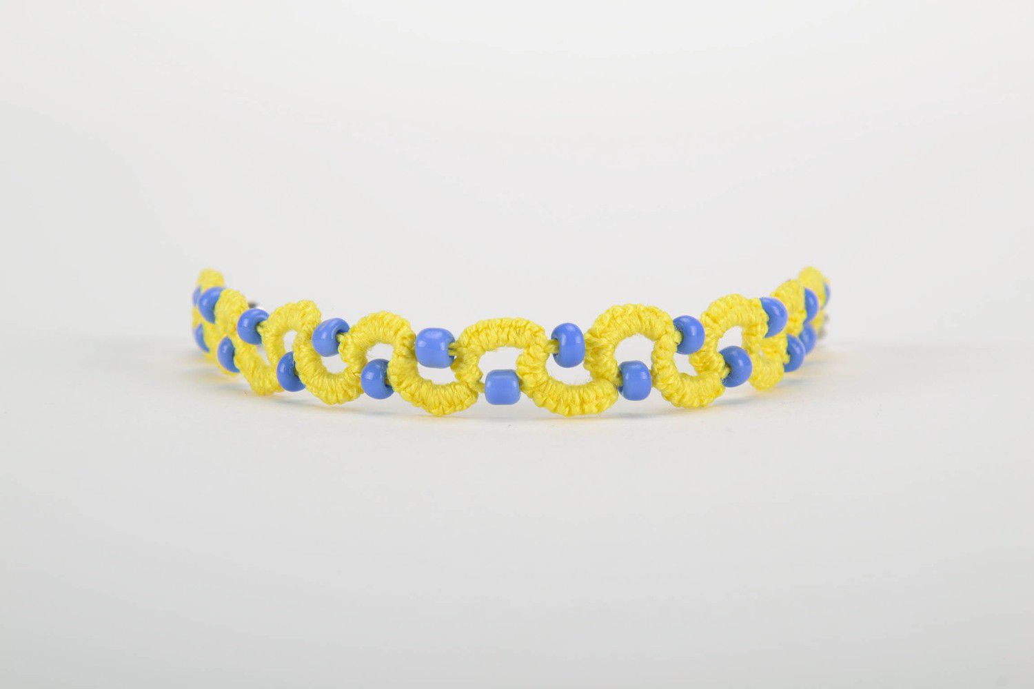 Yellow and blue bracelet made from cotton threads photo 3
