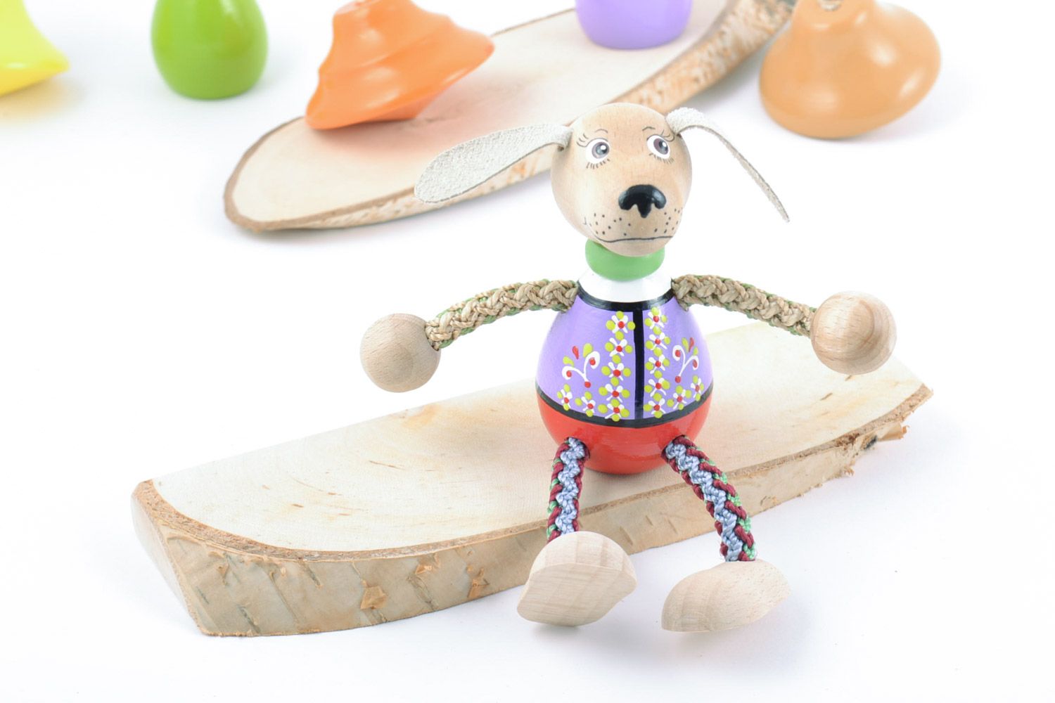 Cute small painted wooden eco toy dog with cord paws handmade for children photo 1