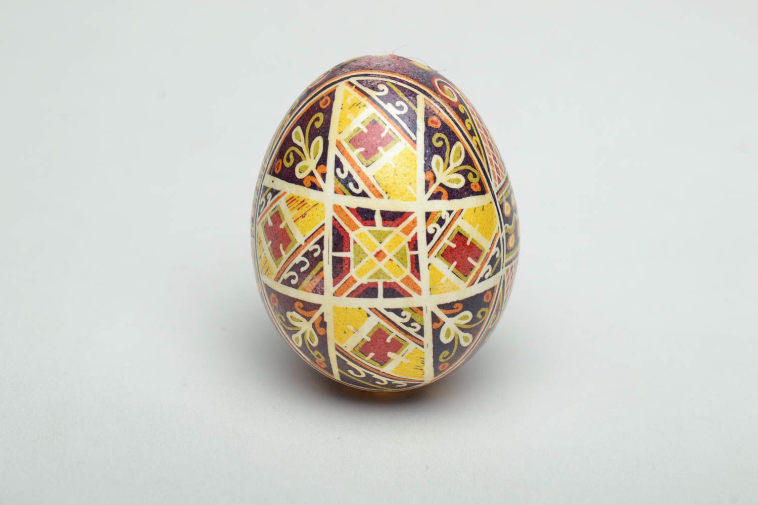 Painted egg with traditional symbolics photo 2