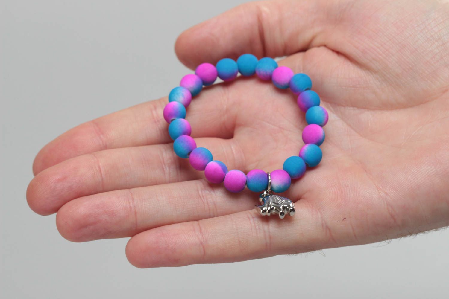 Colorful children's handmade beaded wrist bracelet with elephant charm photo 5
