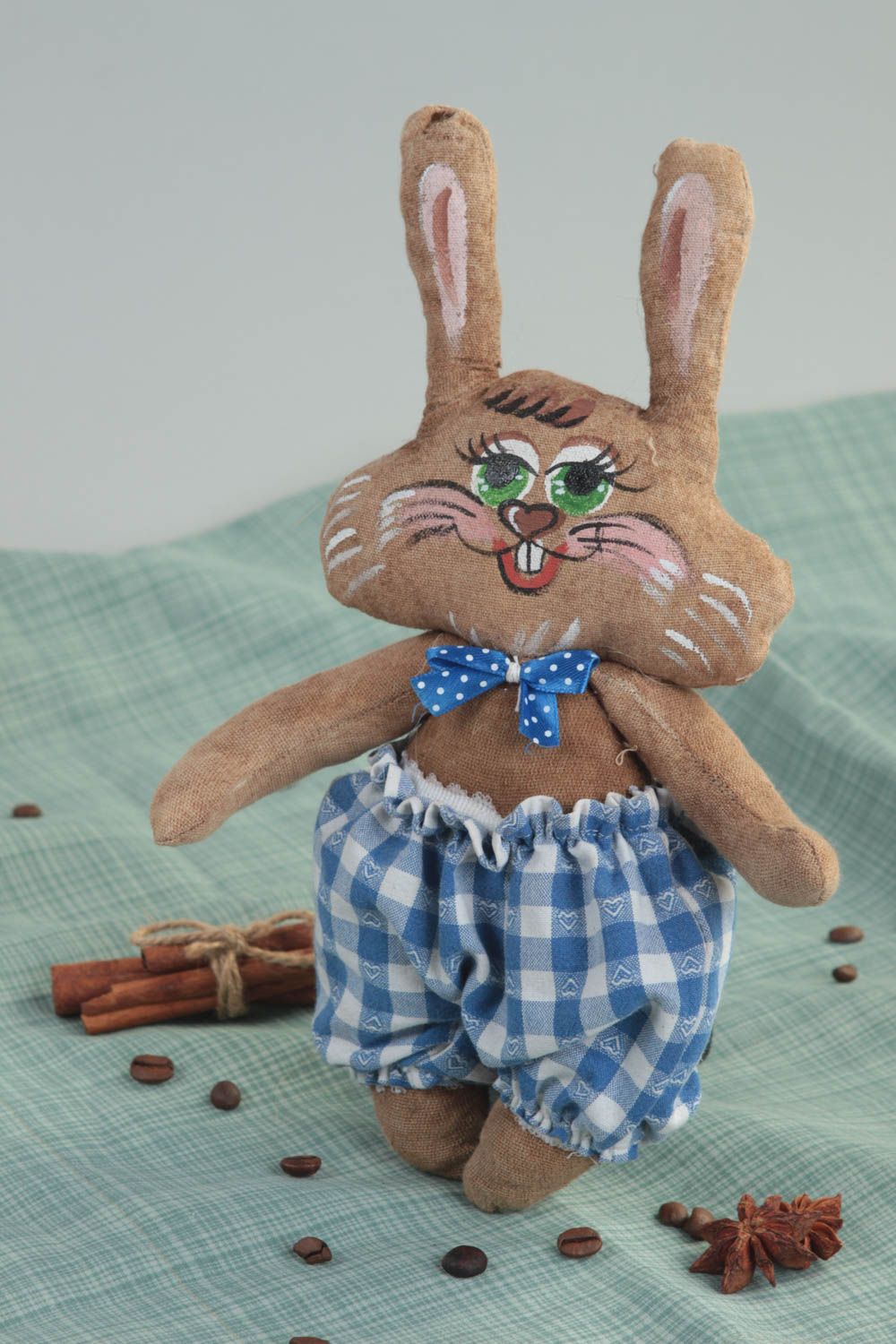 Авторская игрушка из ткани с пропиткой кофе в виде зайца в клетчатых штанах фото 1