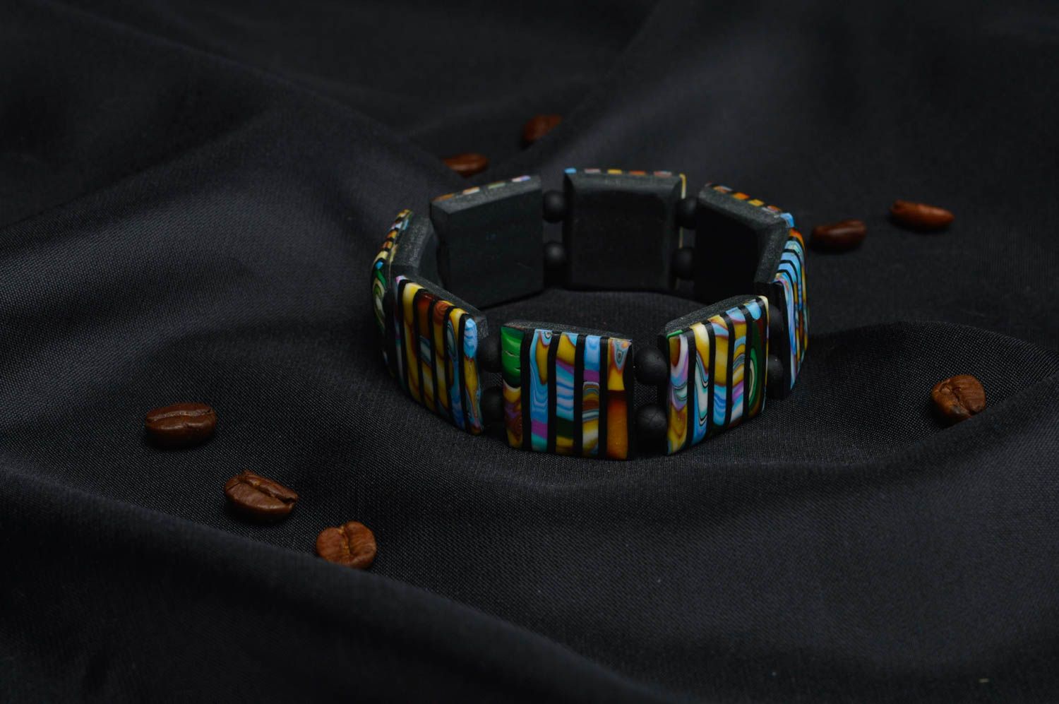 Blue, gold, black colors fashion bracelet on elastic cord photo 1