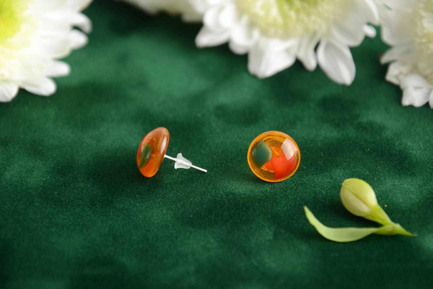 Handmade transparent orange stud earrings made using glass fusing technique photo 1