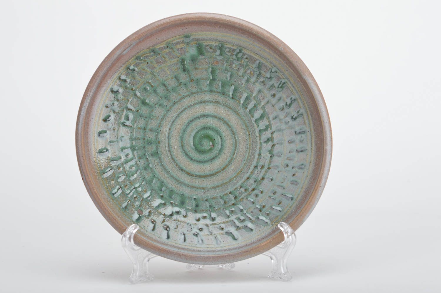 Красивая керамическая тарелка из красной глины с узором для декора Феерверк фото 1