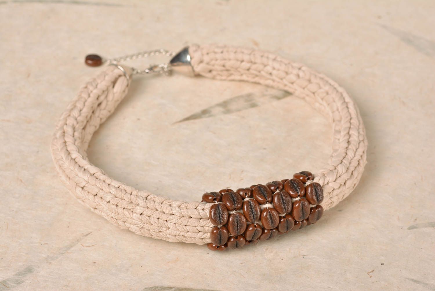 Hand-knitted necklace made of synthetics with the coffee beans of polymer clay  photo 1