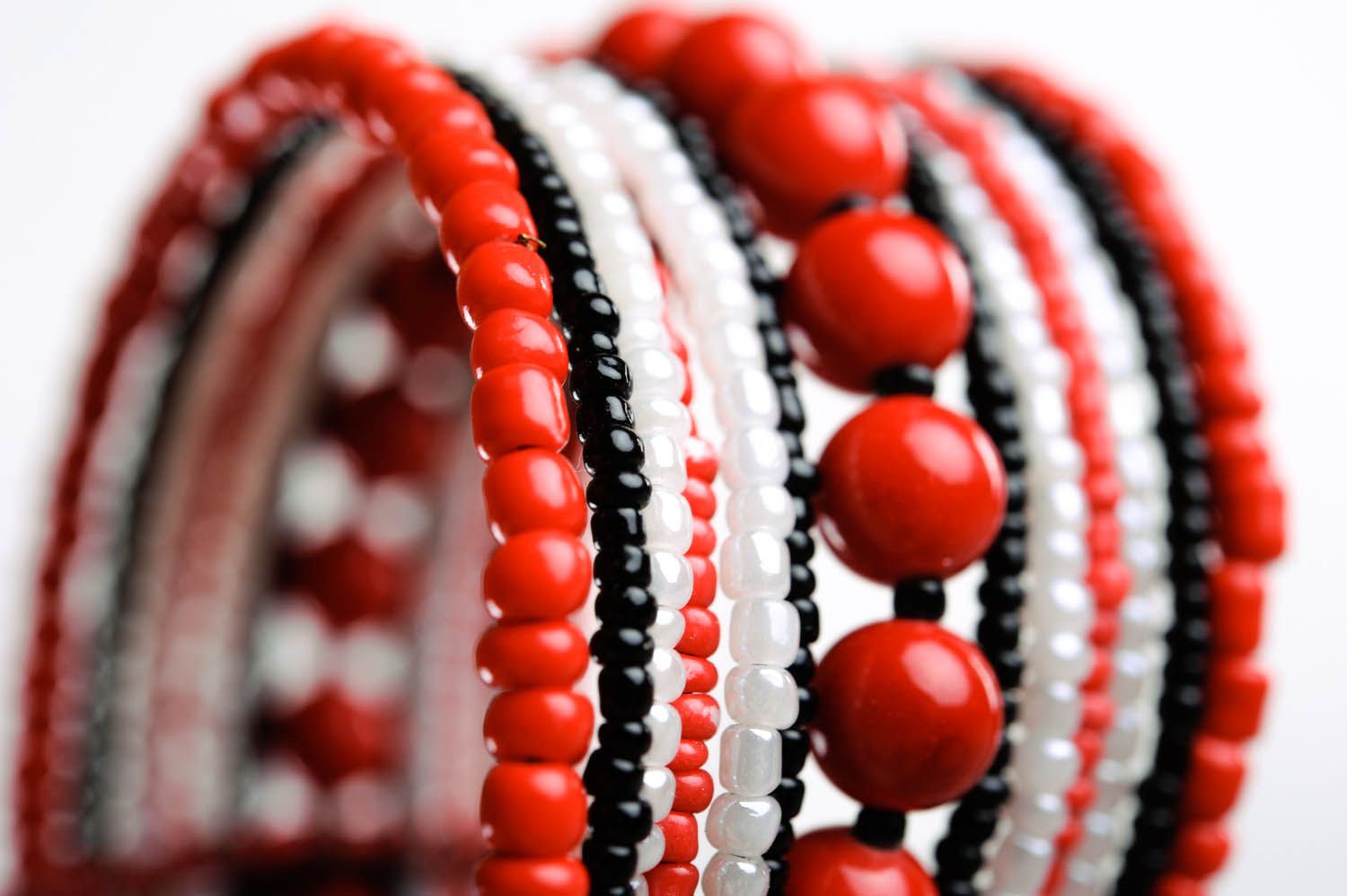 Wide handmade ethnic beaded bracelet with multiple rows with coral stones for women photo 2