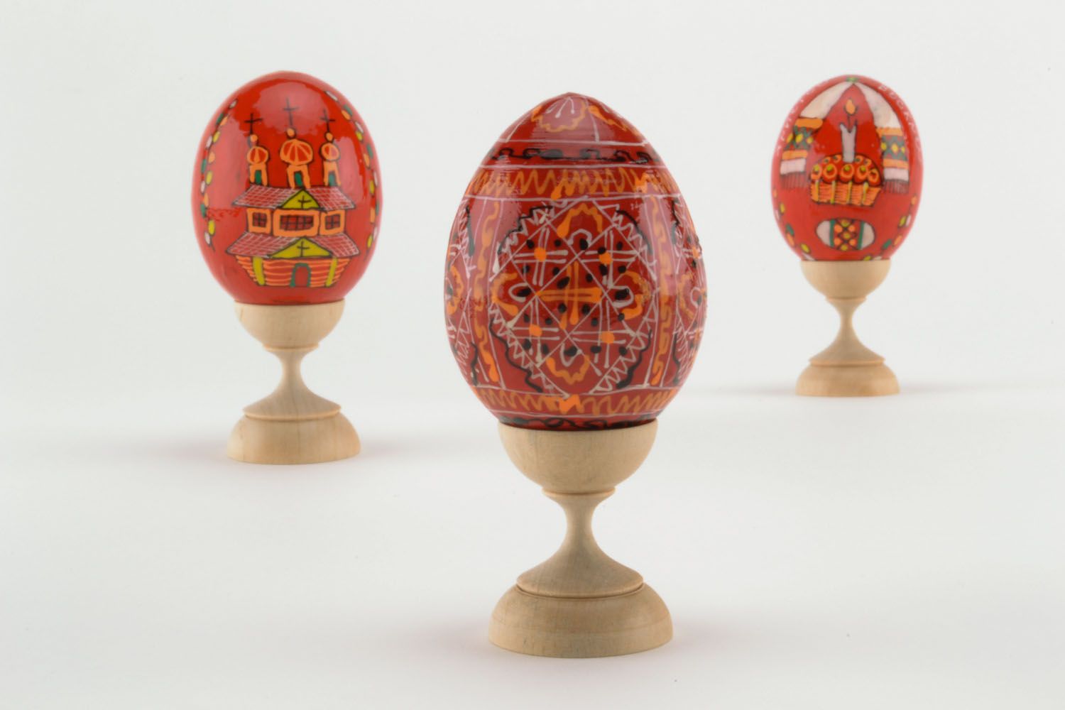 Wooden egg in red colors photo 1