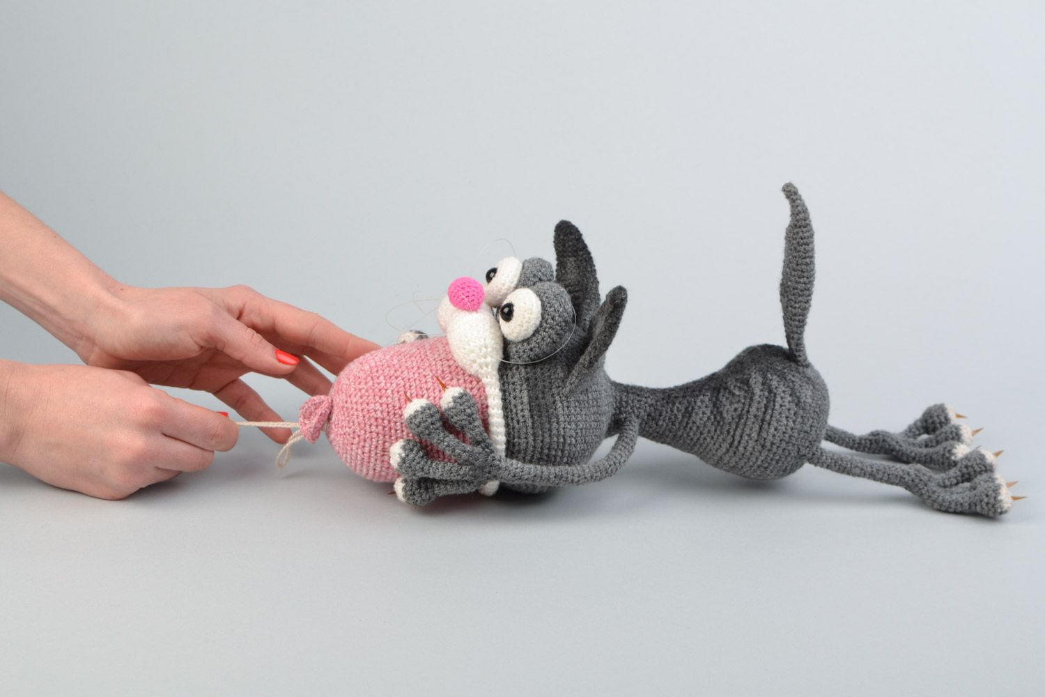 Handmade crocheted soft toy funny grey cat with sausage for children photo 2