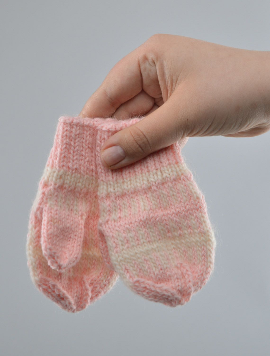 Small handmade warm winter mittens knitted of pink woolen threads for little girl photo 3