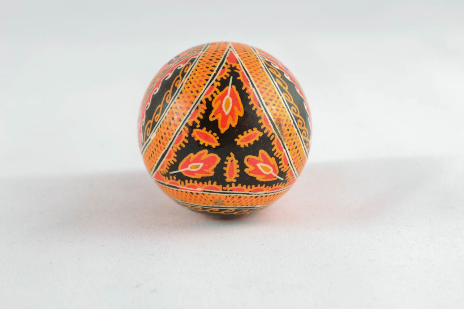 Painted Easter egg with symbols of wealth and strength photo 1