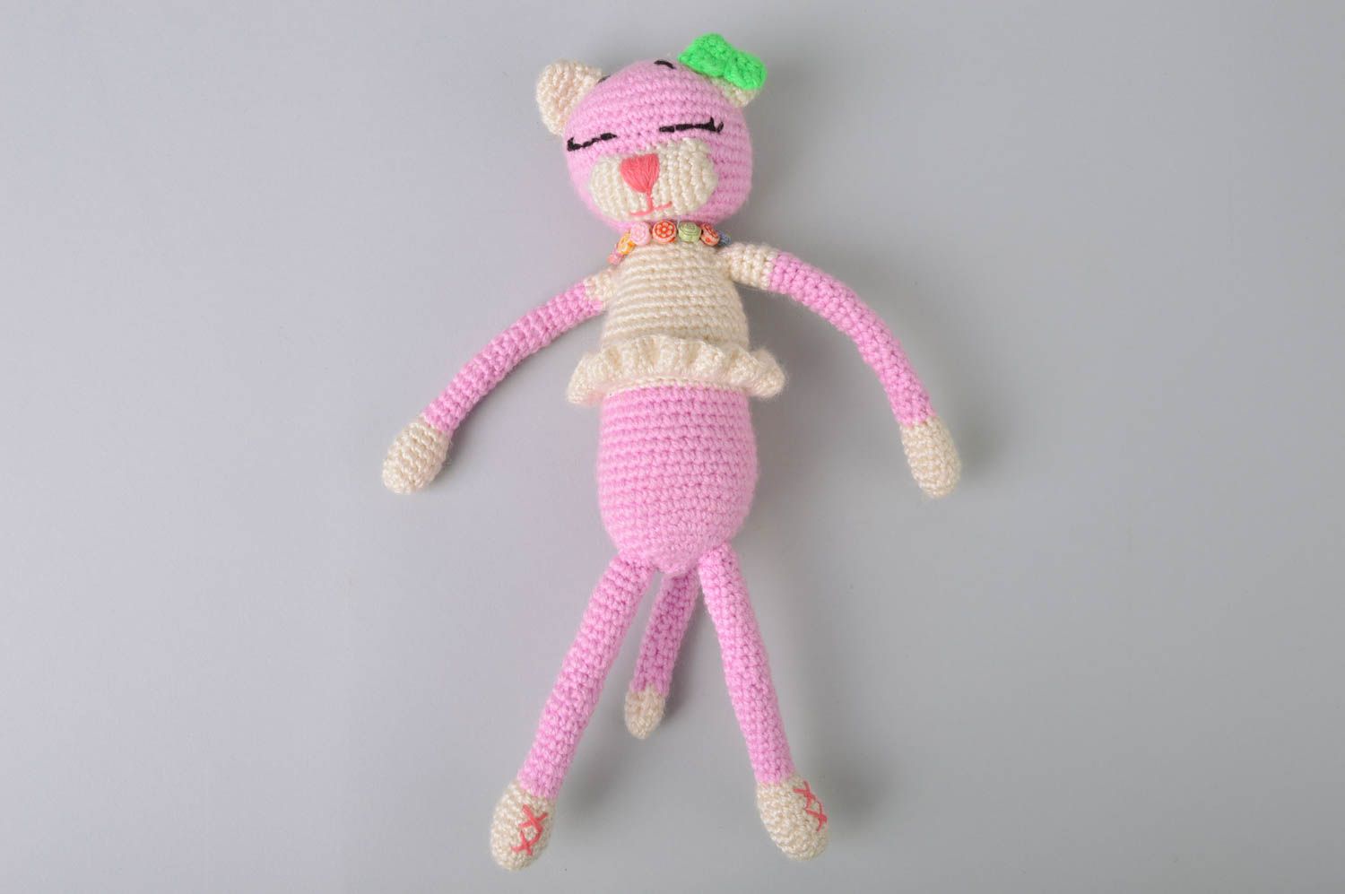 Handmade designer crocheted soft toy pink cat in dress with green bow  photo 2