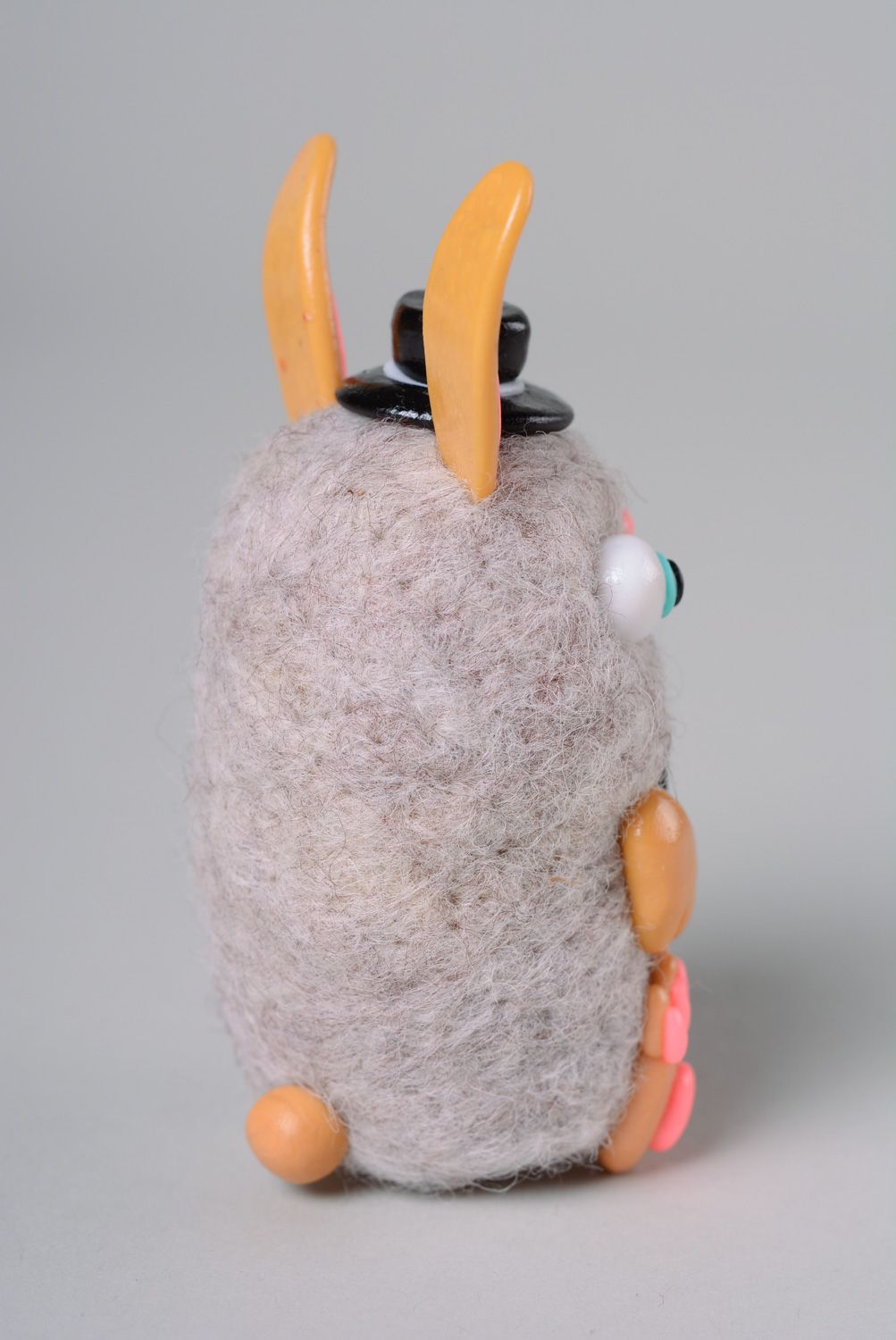 Muñeco de fieltro de lana natural y arcilla hecho a mano muñeco de trapo foto 3