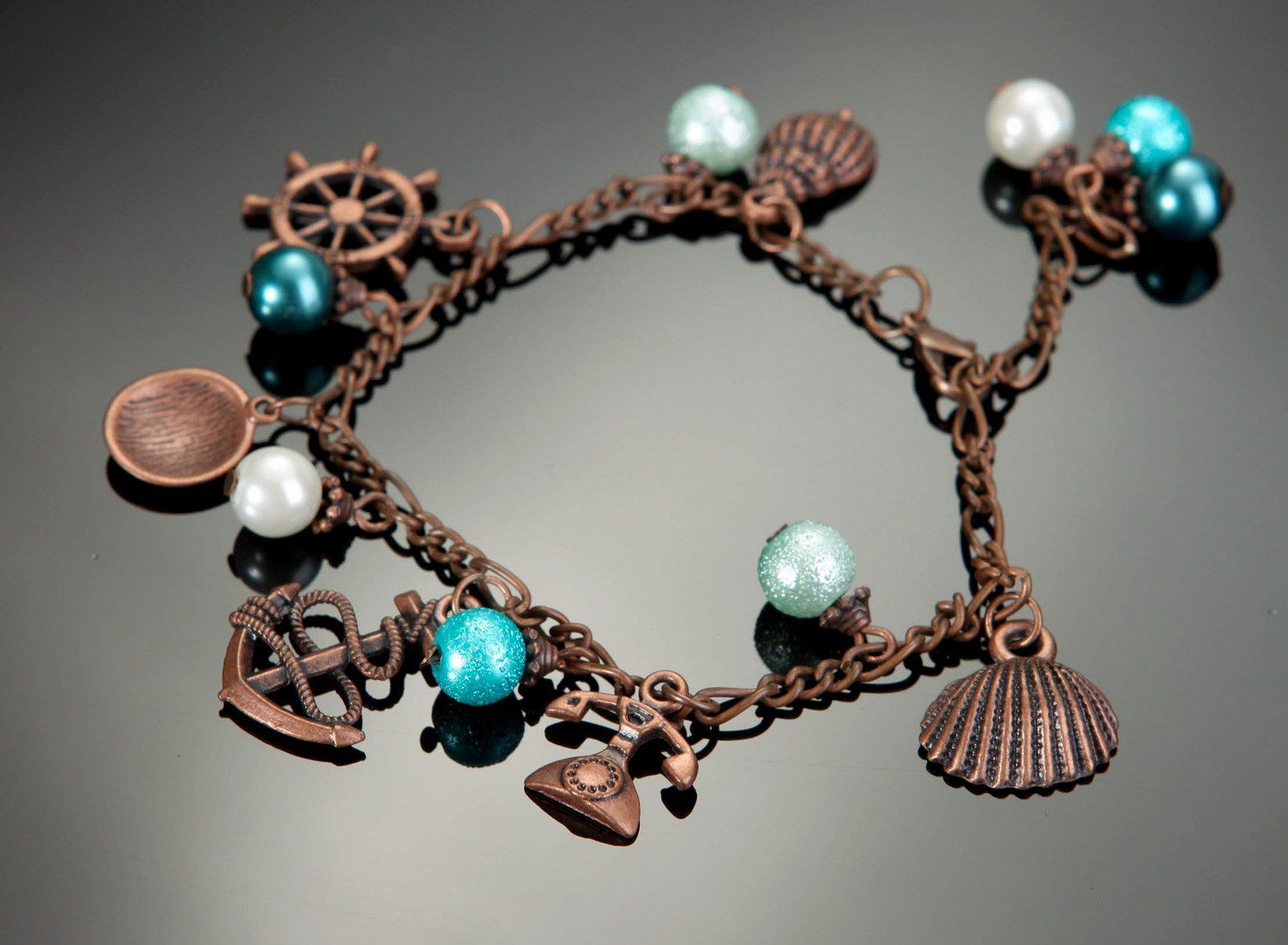 Bronze bracelet with ceramic pearls Sea photo 1