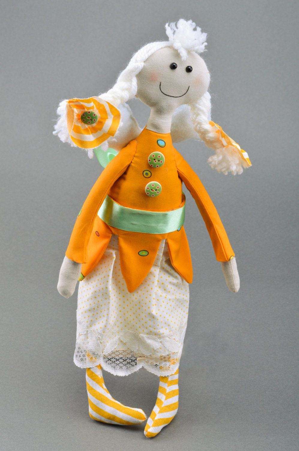 Handmade yellow textile soft doll in the shape of fairy with braids for children photo 2