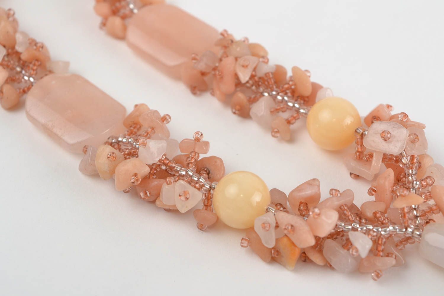 Tender long peach-colored handmade necklace made of beads and natural stones  photo 5
