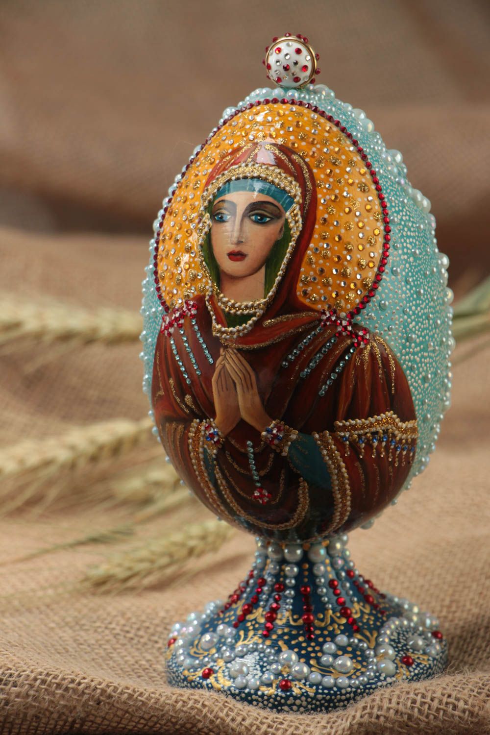 Handmade wooden egg with painted icon of Seven Arrows Mother of God on stand photo 1