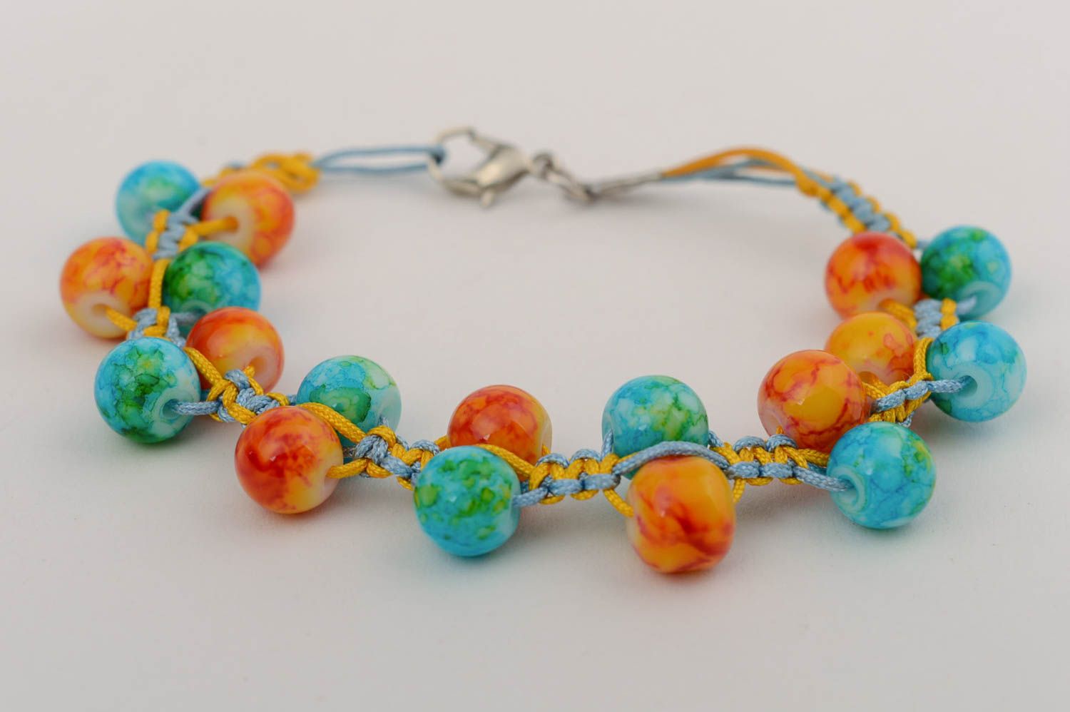 Bracelet en perles de verre bleu orange technique de macramé fait main photo 2