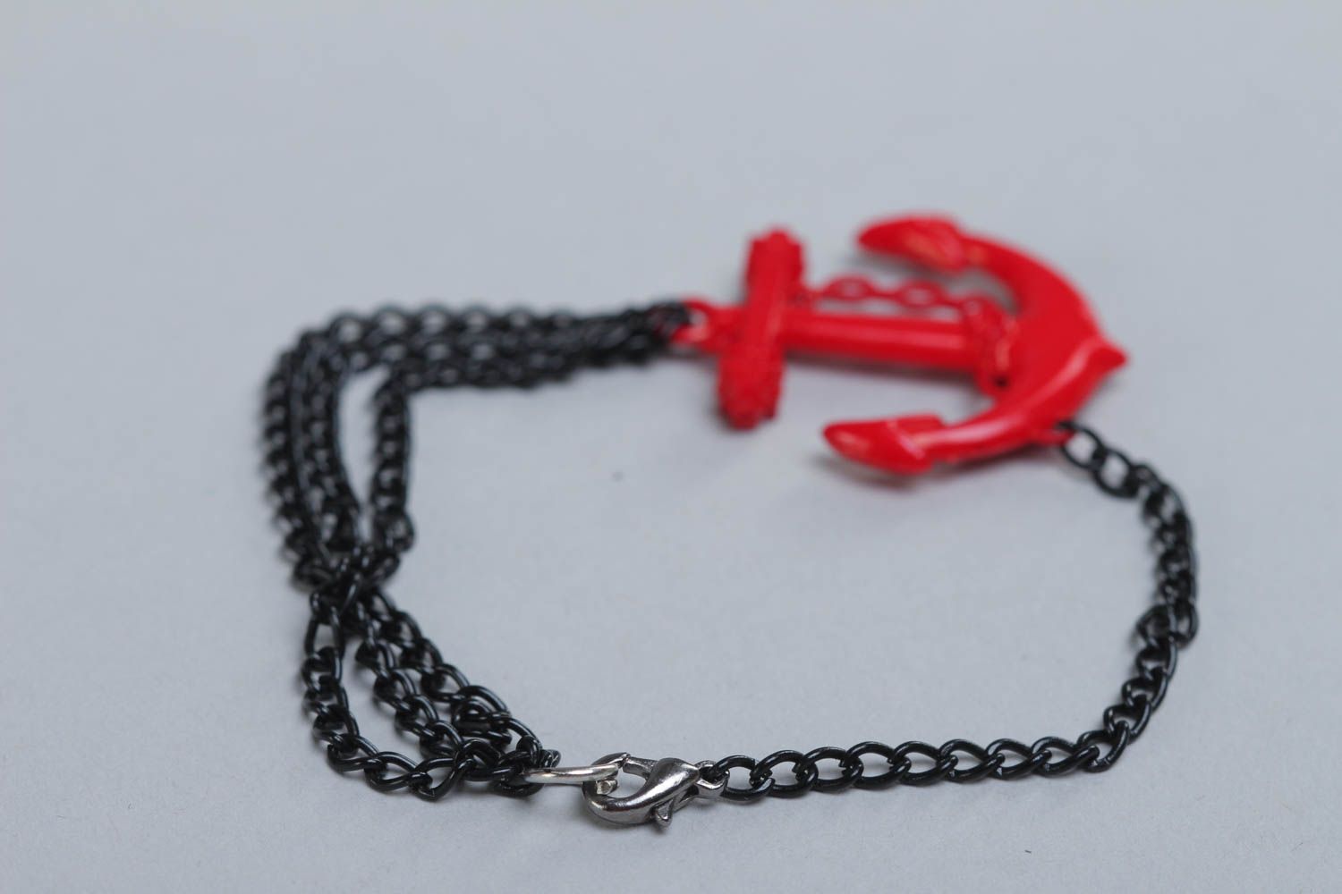 Handmade festive red and black metal and plastic wrist bracelet photo 4