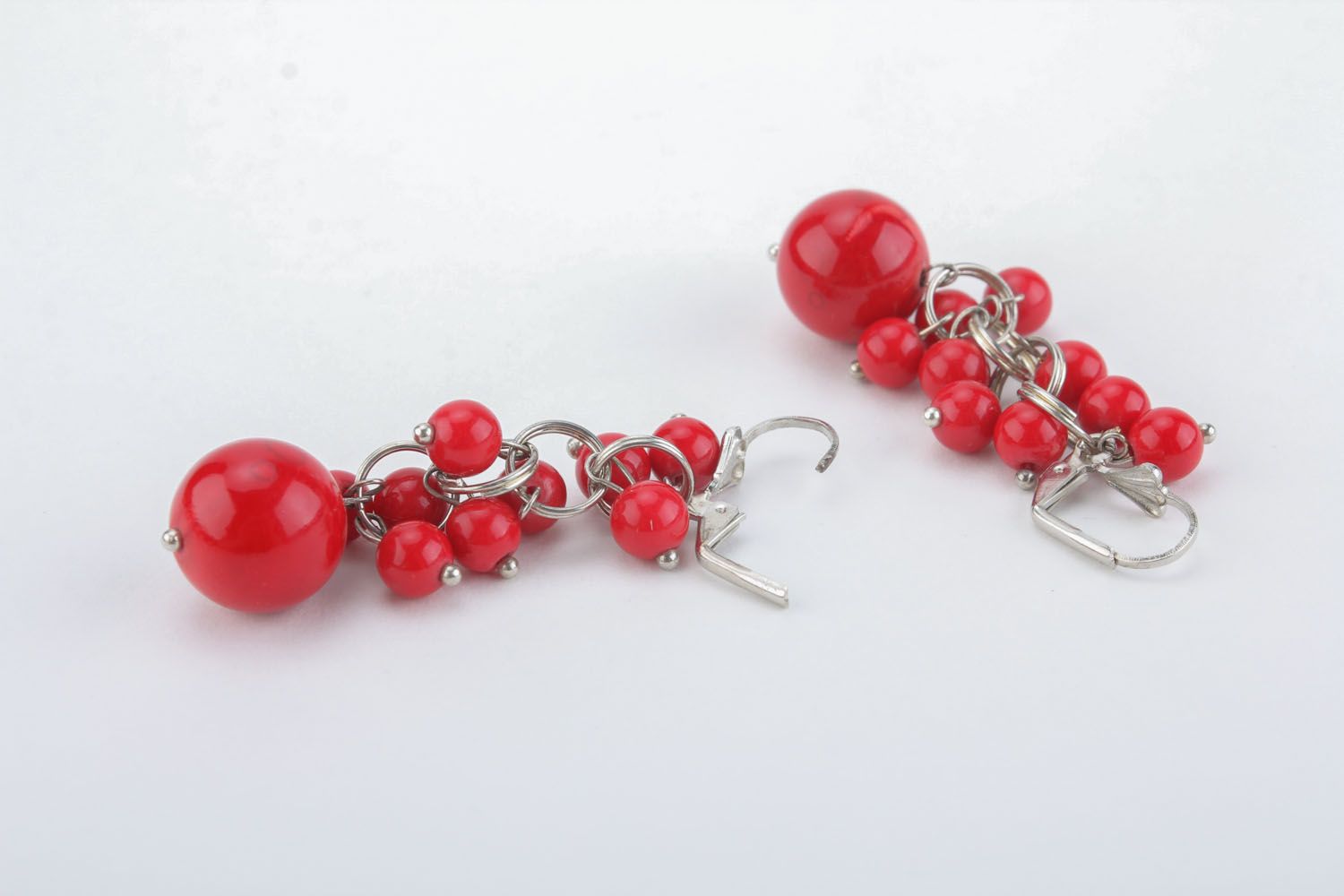 Long earrings with natural coral photo 3