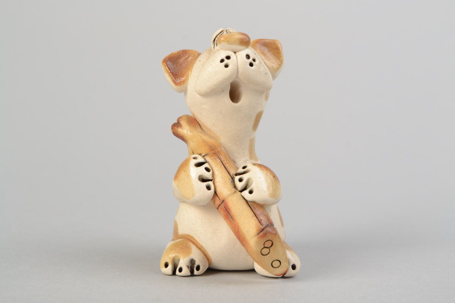 Handmade ceramic cat with sausage painted with colored glaze interior decor photo 1