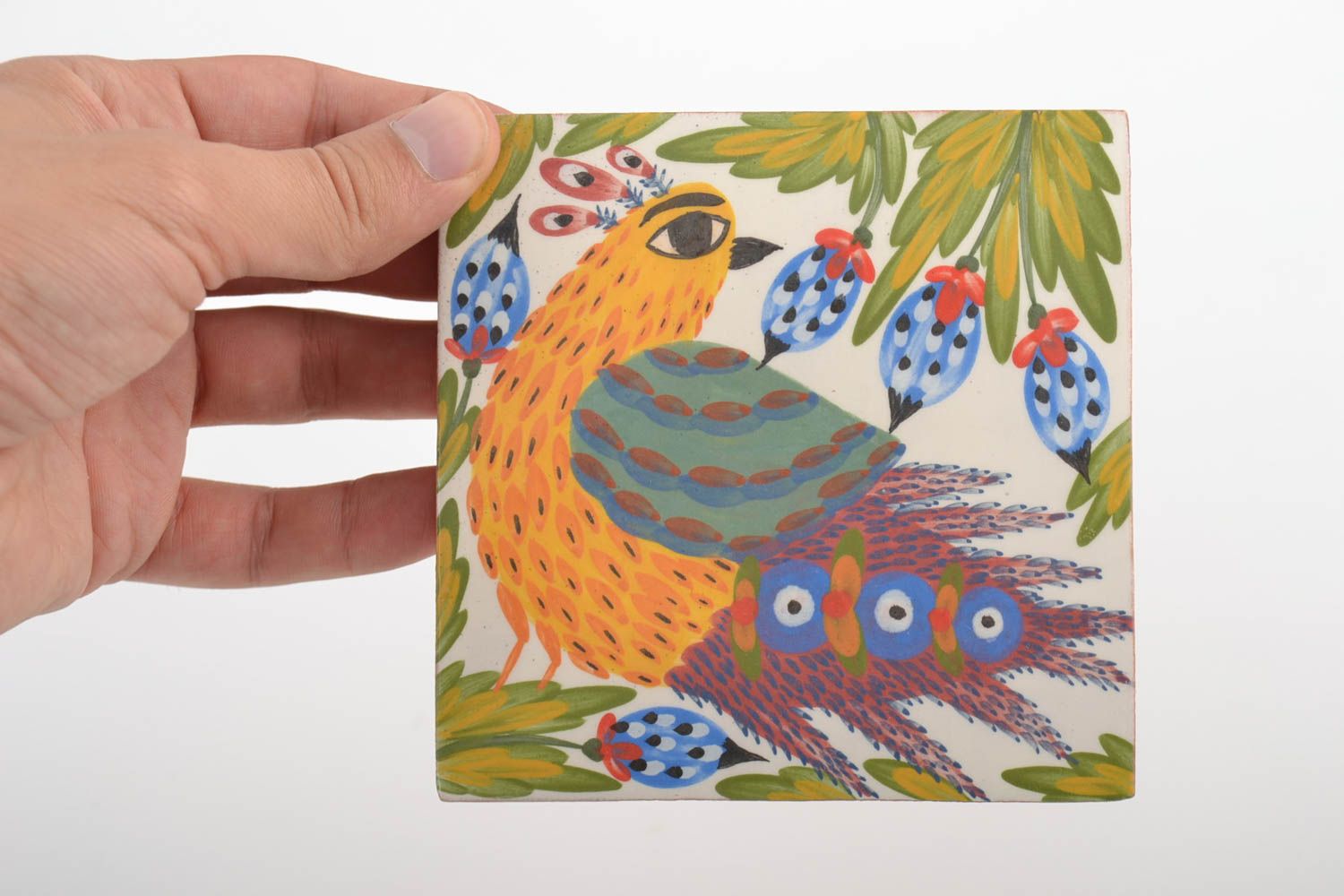 Handmade designer ceramic facing tile with colorful bird painted with engobes photo 2