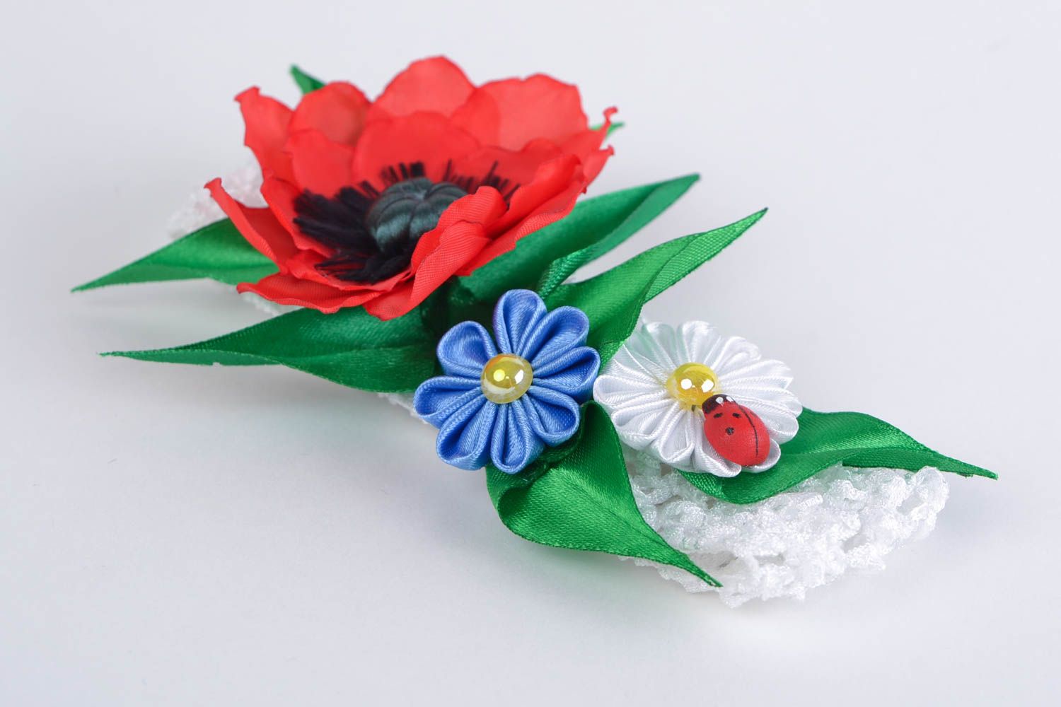 Bandeau avec fleurs kanzashi sur élastique blanc ajouré fait main pour enfant photo 4