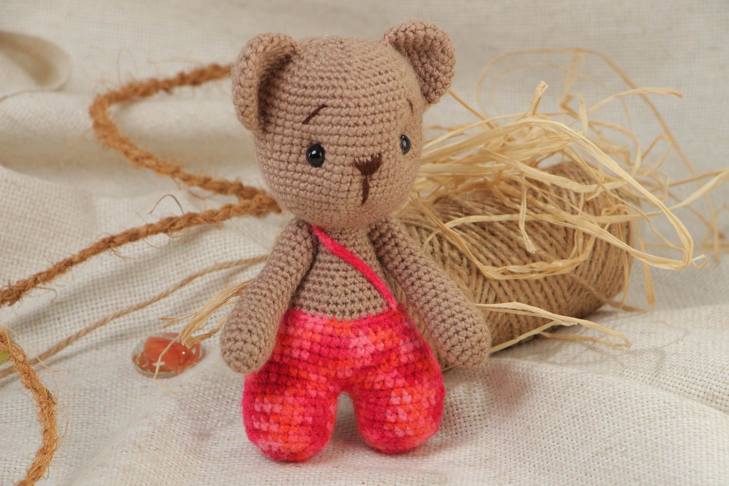 Small handcrafted soft crocheted teddybear for children made using knitting needle photo 1