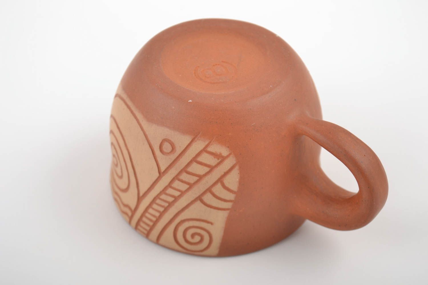 8 oz clay cup in terracotta and beige color with cave drawings photo 4
