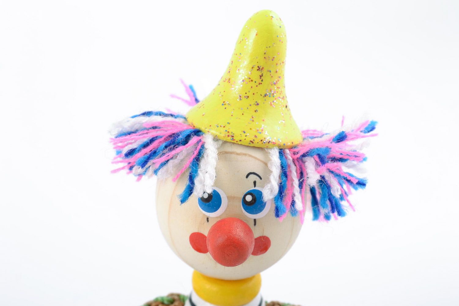 Handmade unusual beautiful wooden toy funny colored clown decorated with eco-paints photo 3