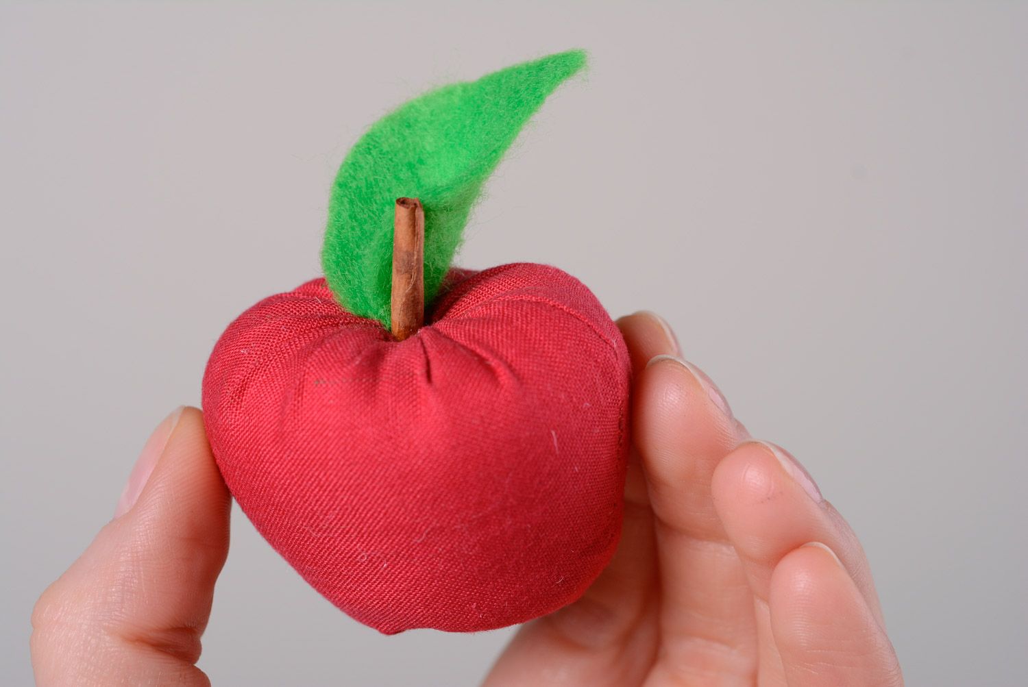 Handmade interior soft toy in the shape of red apple with cinnamon stick photo 5