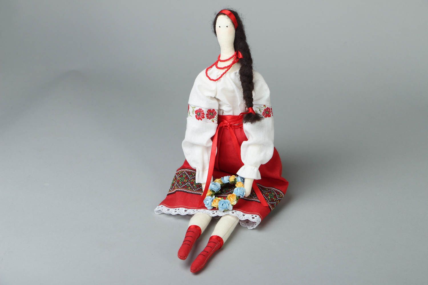 Soft doll in national costume photo 1