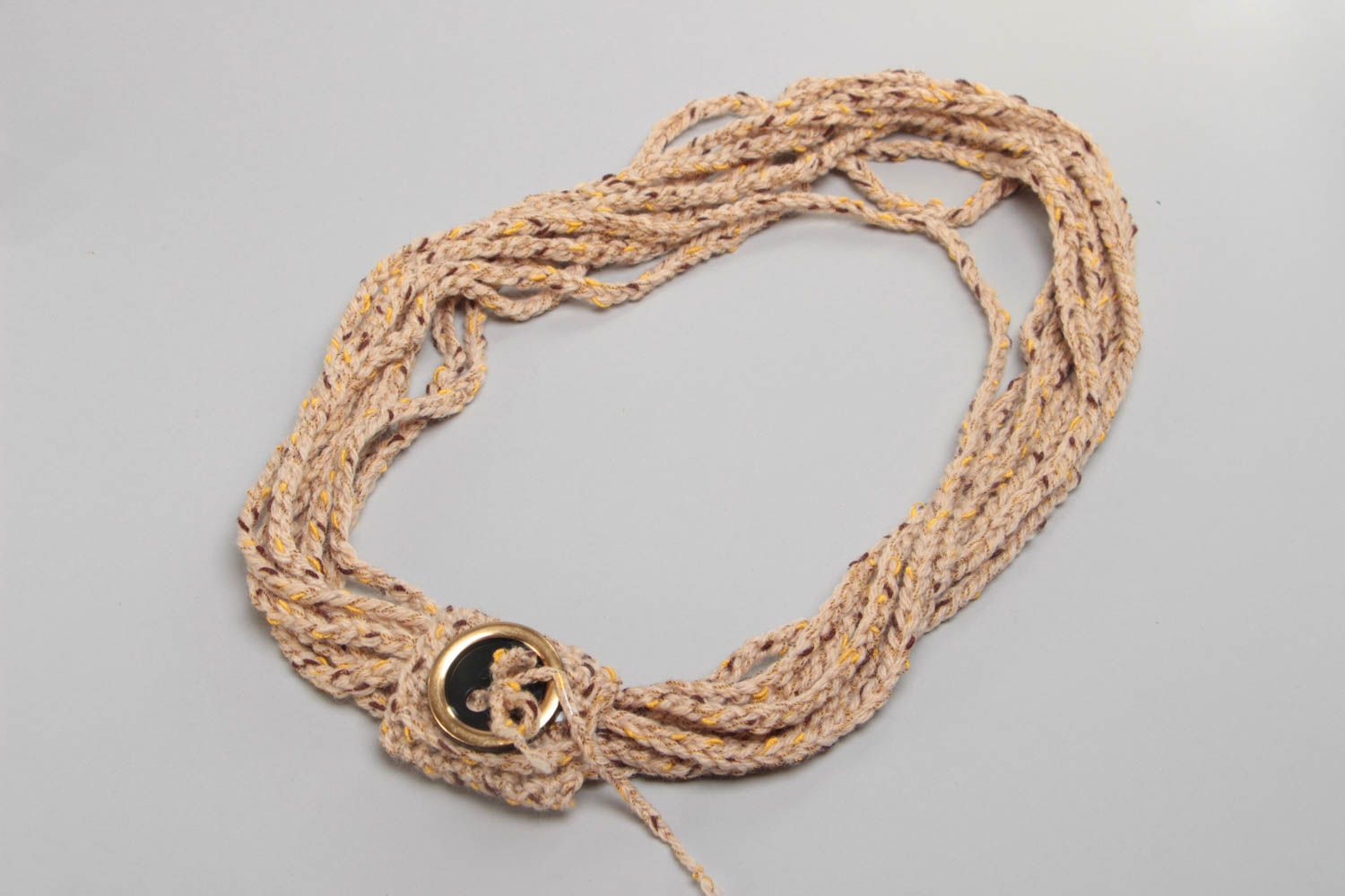 Unusual stylish beautiful handmade crochet scarf with button narrow beige photo 2