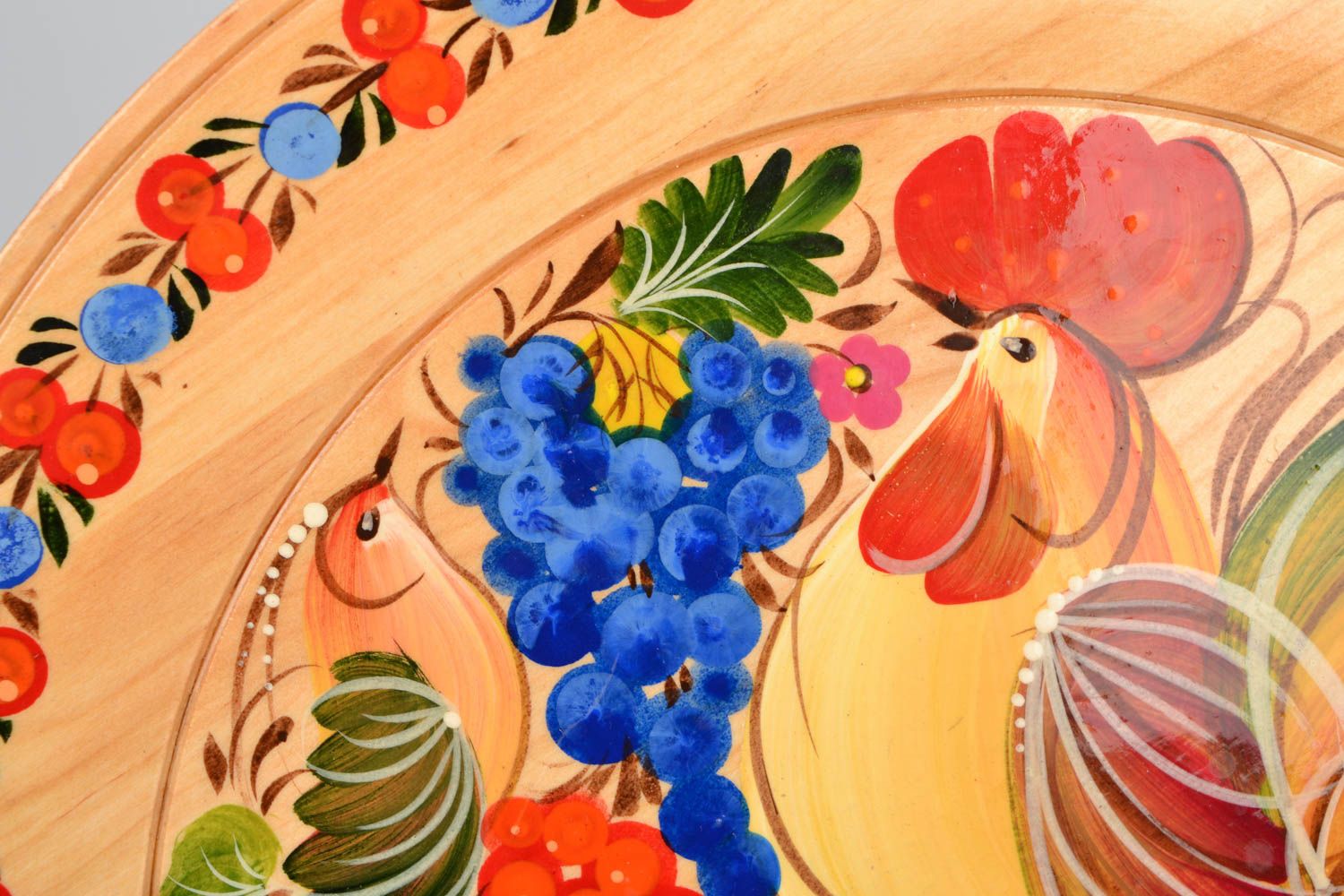 Decorative plate with Petrikivka painting photo 4