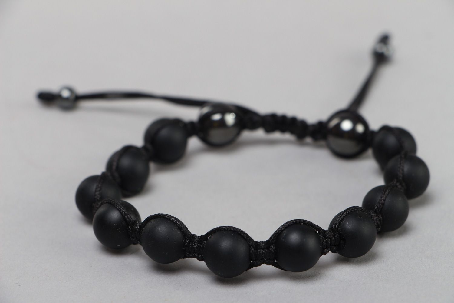Handmade woven wrist bracelet with black shungite and hematite stone beads  photo 1