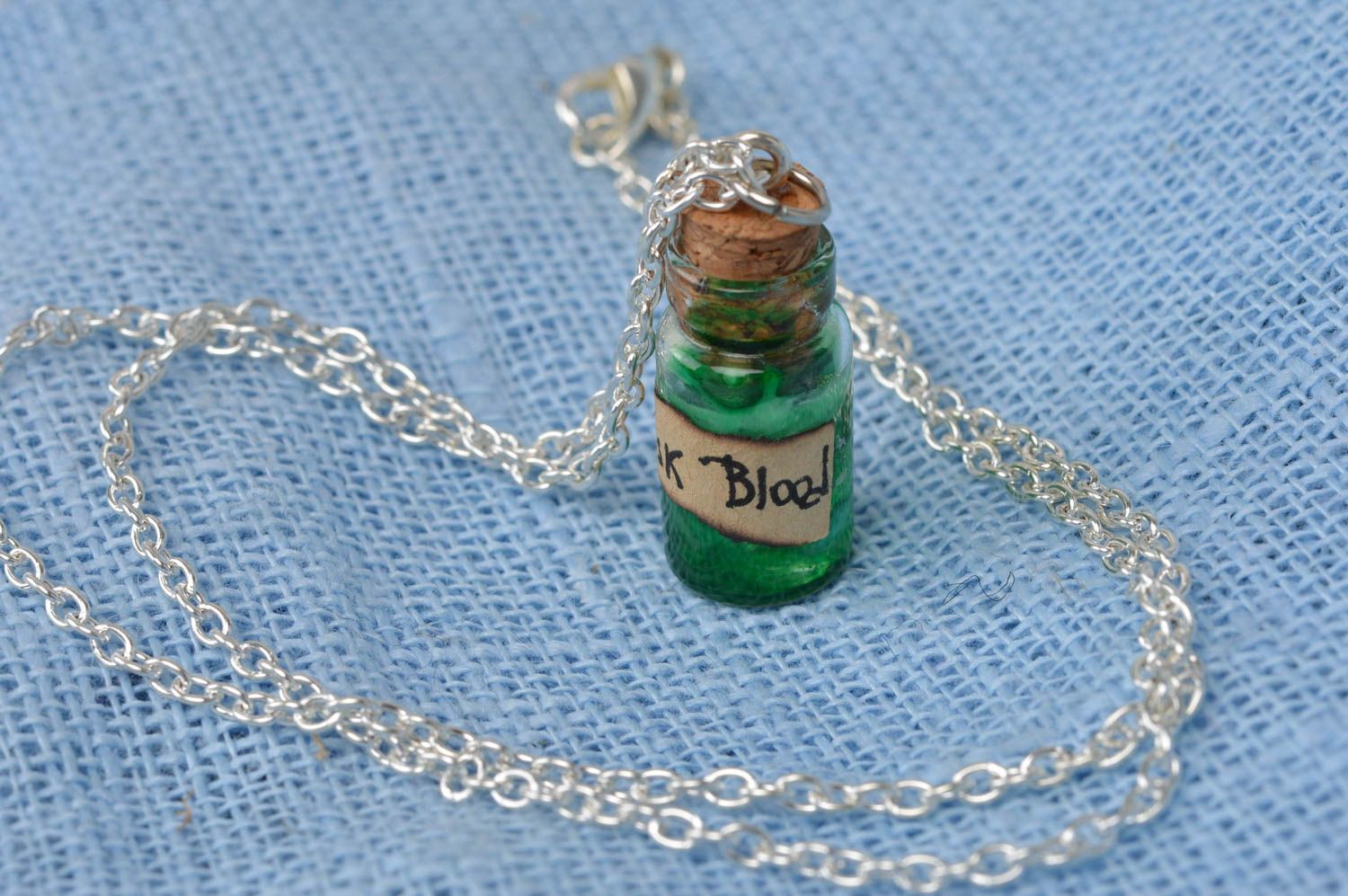 Handmade beautiful green pendant in shape of glass jar with epoxy resin photo 2